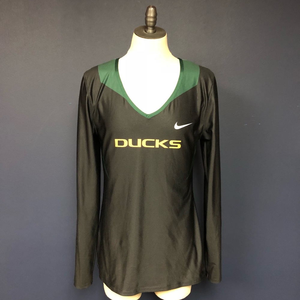 Woman’s Dri Fit Oregon ducks shirt by Nike medium
